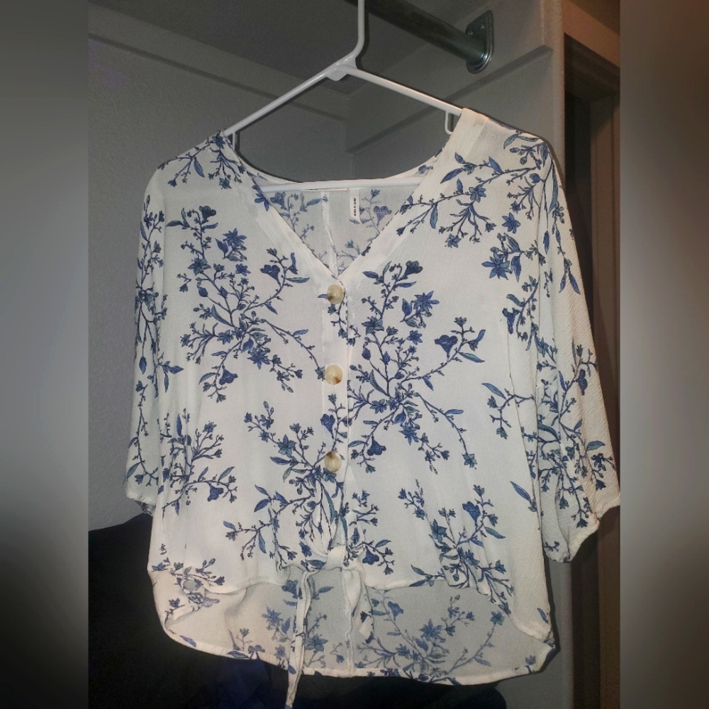 White with blue flower design blouse